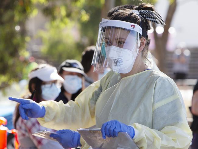 Thousands of South Australians lined up for hours to be tested for COVID-19 after the cluster was announced. Picture: Emma Brasier