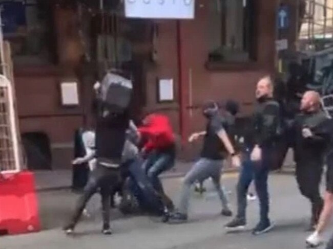 Manchester United and Leeds fans were fighting in the street before their EPL match.