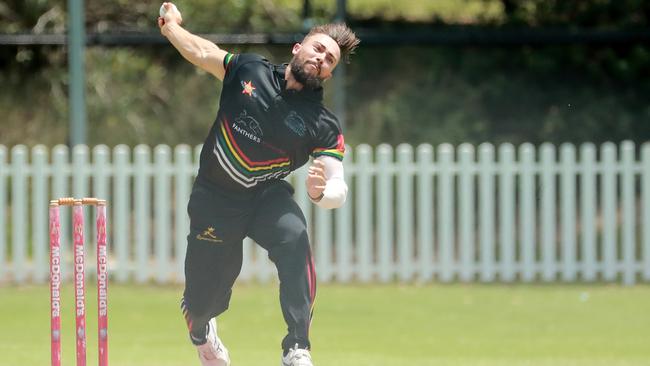 Penrith’s Kaine Balgowan bowls against UNSW at David Phillips South.