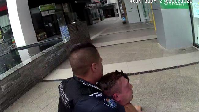 Police place Shaun Christopher Michael in a choke hold. Picture: Supplied