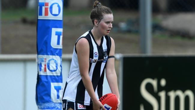 Grace Chopin kicks the ball out from the Palmerston Magpies box in the first womens game of the NTFL 22/23 season. Picture: (A)manda Parkinson