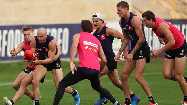 Brett Bewley is tackled by teammate Mitch Crowden at Dockers training. Picture: Paul Kane/Getty Images