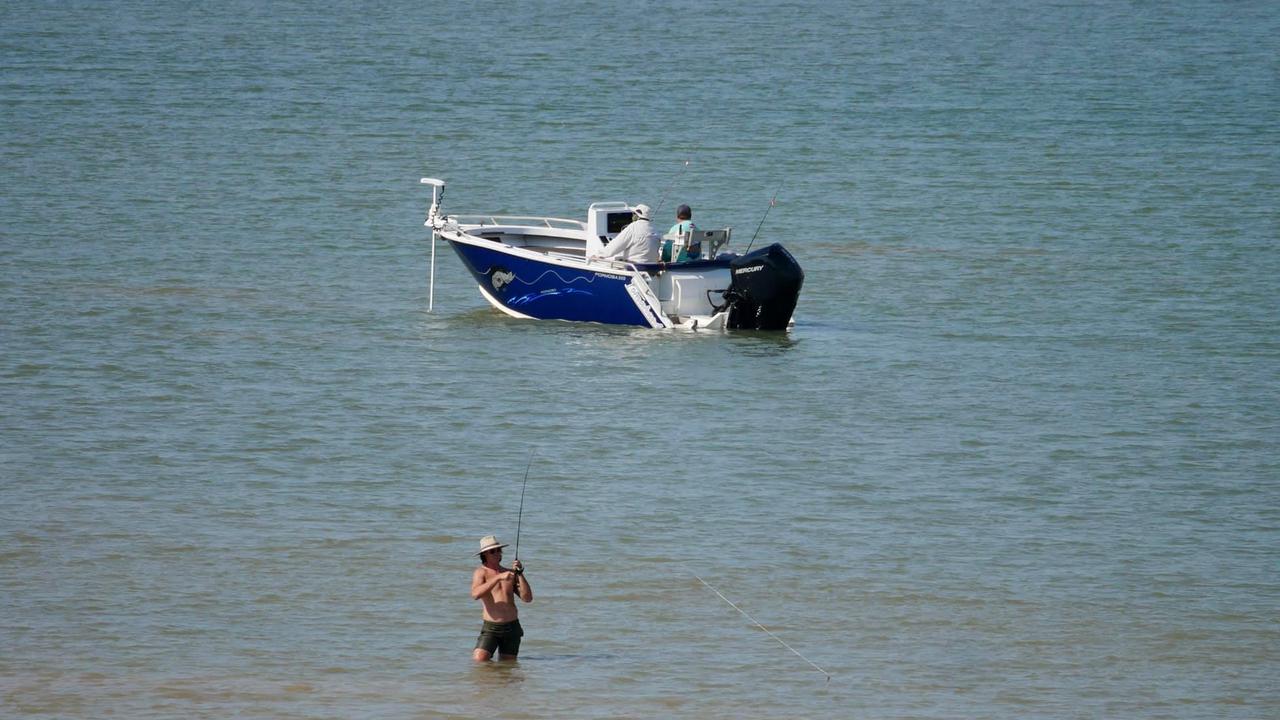 A man has waded into croc-inhabited waters in th hope of a bite. Picture: Supplied.