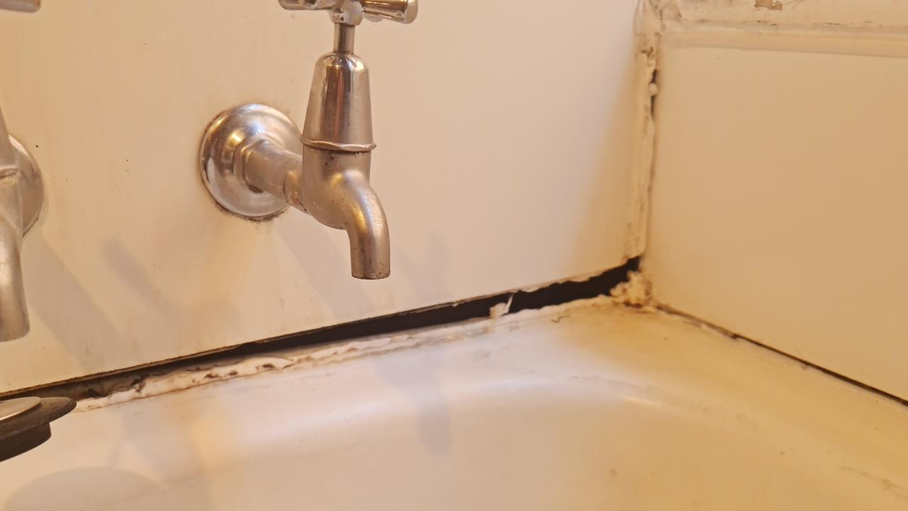 Gaps between the wall and the bath. Picture: Supplied