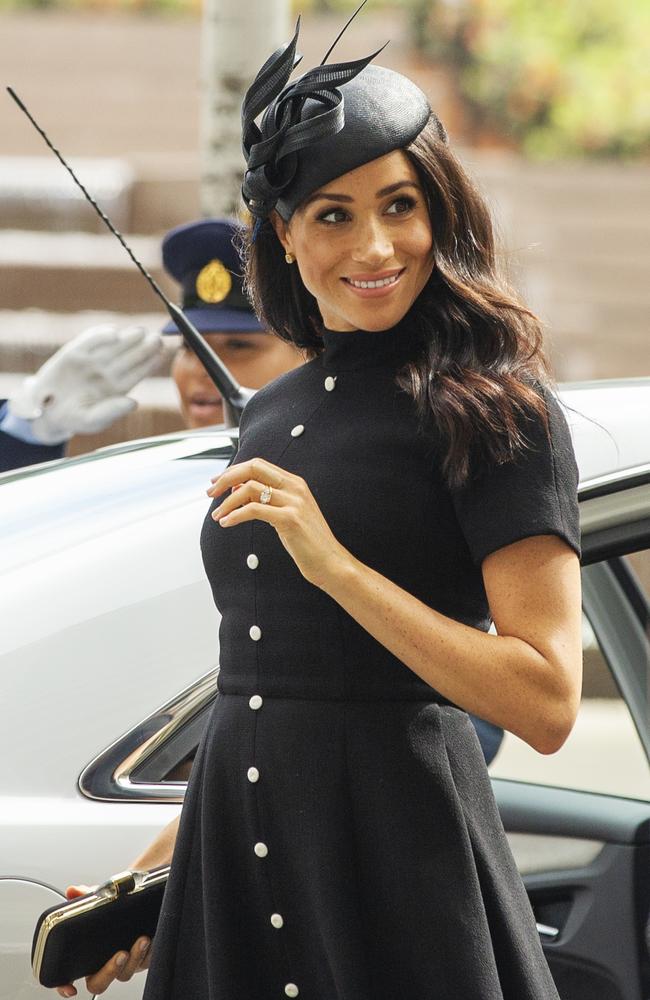 The Duchess of Sussex turned heads in this all-black outfit and headpiece. Picture: News Corp Australia