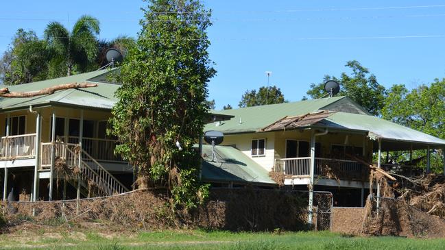 Wujal Wujal residents were forced to flee to their rooftops on December 17, and were evacuated two days later. Large trees and parts of a fence lay on these rooftops. Picture: Bronwyn Farr