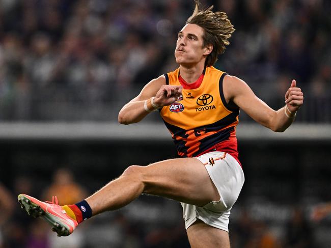PERTH, AUSTRALIA - APRIL 25: Josh Worrell of the Crows kicks the ball during the 2025 AFL Round 07 match between the Fremantle Dockers and the Adelaide Crows at Optus Stadium on April 25, 2025 in Perth, Australia. (Photo by Daniel Carson/AFL Photos via Getty Images)
