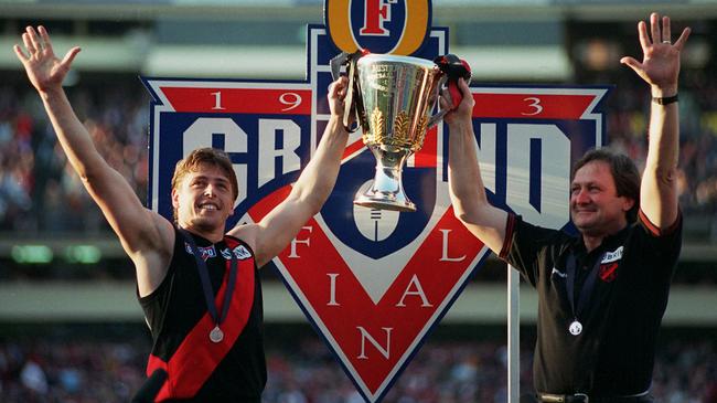 Mark Thompson with Kevin Sheedy after winning the 1993 premiership.