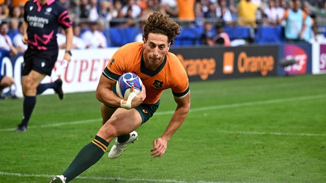 Mark Nawaqanitawase scoring for the Wallabies at the World Cup. (Photo by Olivier CHASSIGNOLE / AFP)