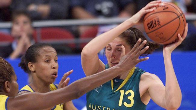 Basketballer Jenny Whittle (r) with Janeth Arcain. Womens basketball - Australia vs Brazil match at Sydney Olympic Games 29 Sep 2000. a/ct