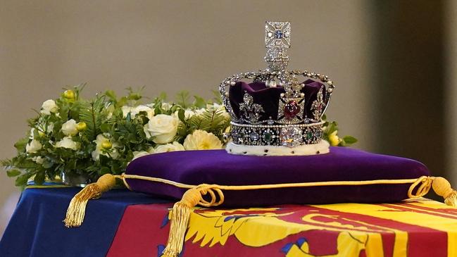 The coffin of Queen Elizabeth II, draped in a Royal Standard and adorned with the Imperial State Crown. Picture: AFP