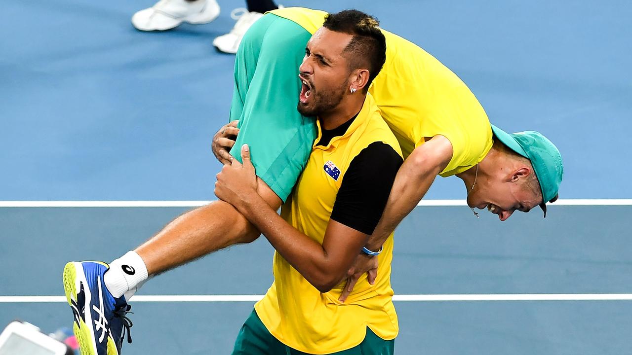 Nick Kyrgios of Australia carries teammate Alex de Minaur at the ATP Cup.