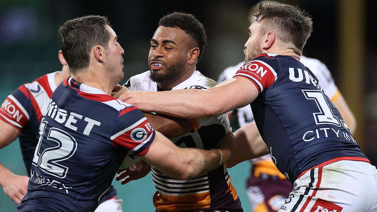 Ezra Mam is wrapped up by the Roosters defence. Picture: Getty Images