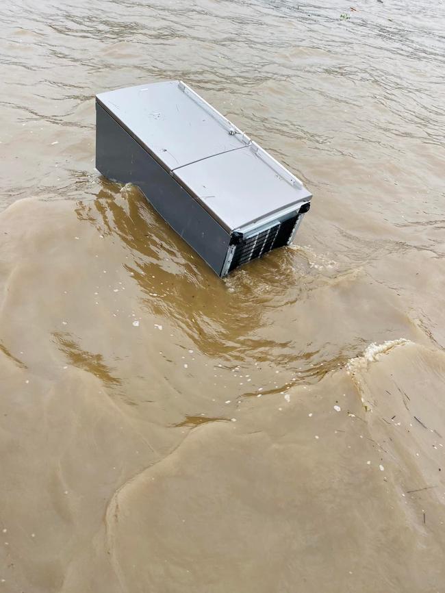 Items such as fridges and tyres are being removed from the water. Picture: Marine Area Command – NSW Police