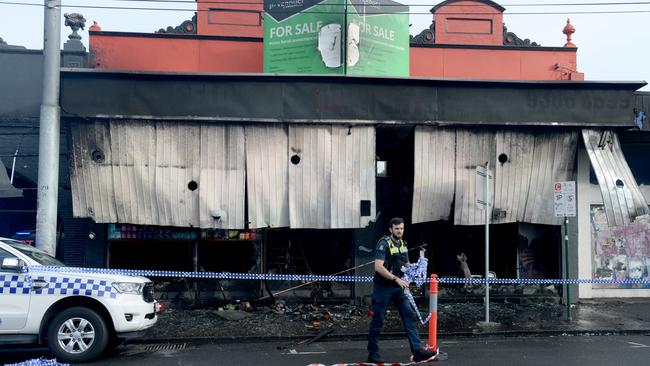 Police investigate the firebombing of a tobacconist in Melbourne’s north earlier this month. Picture: Andrew Henshaw