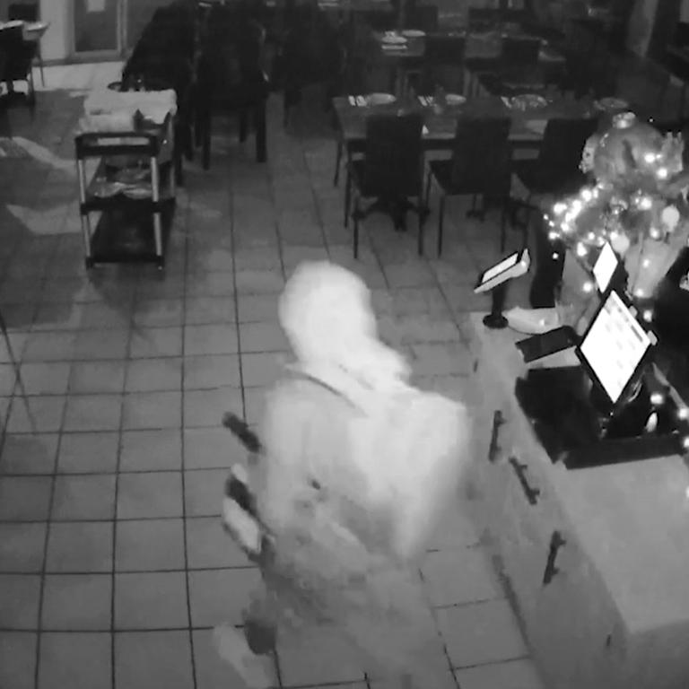 A person breaks into Kalidonis Taverna. Supplied: CCTV Footage