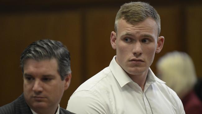 NRL player Matthew Lodge in a New York court with his lawyer. Picture: Alex Towle