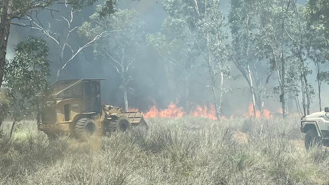 Mr Webster praised Acacia Land Management for their work battling the blaze in the front end loader. Picture: Alice Springs Volunteer Bushfire Brigade