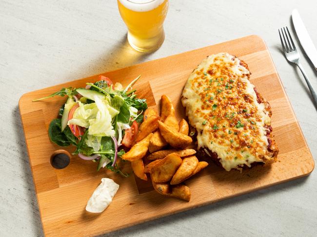 The Cheeky Pint's Parma is so big it has to be served on a chopping board. Image Samantha Scultz