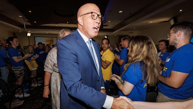 Opposition Leader Peter Dutton greets supporters at Arana Hills on Sunday. Picture: Lachie Millard