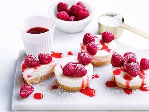 Mini lemon and raspberry frozen cheesecakes.