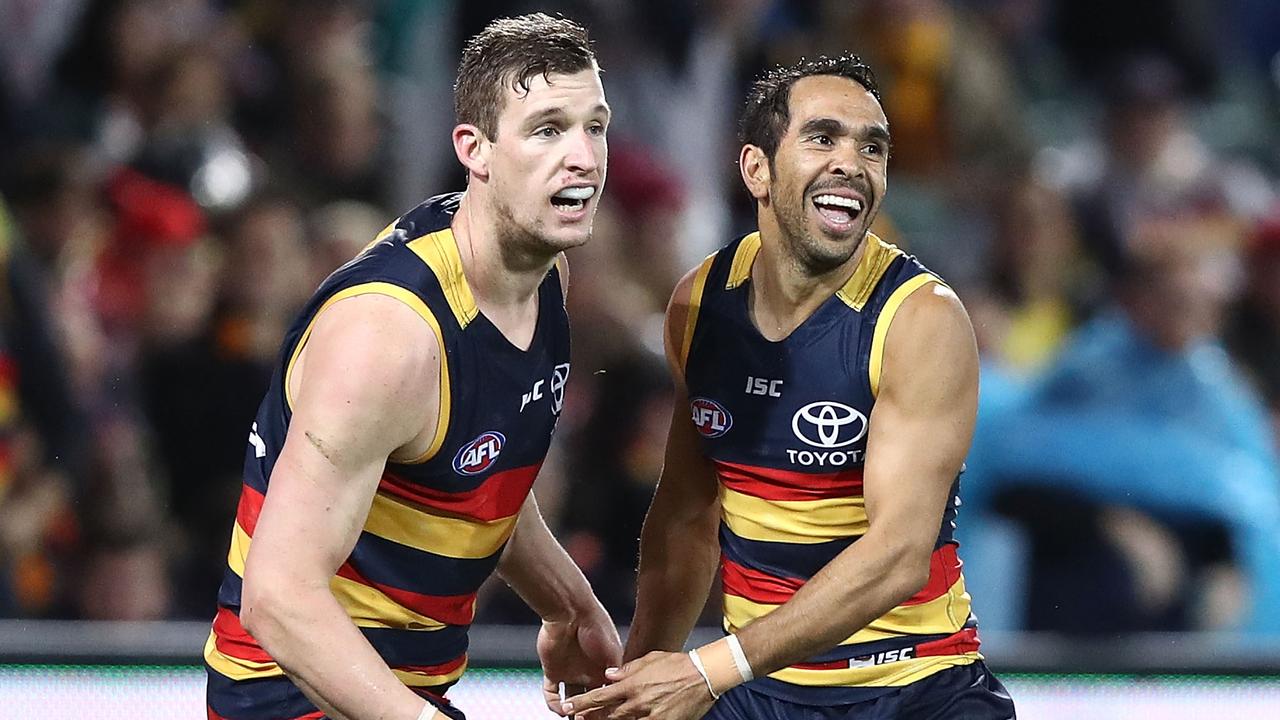 ADELAIDE, AUSTRALIA - JULY 07: Josh Jenkins and Eddie Betts of the Crows celebrate a goal during the round 16 AFL match between the Adelaide Crows and the Western Bulldogs at Adelaide Oval on July 7, 2017 in Adelaide, Australia. (Photo by Ryan Pierse/Getty Images)