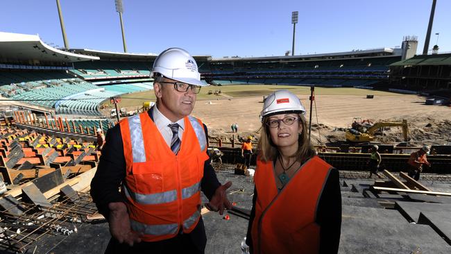 SCG Trust CEO Jamie Barkley and Minister Gabrielle Upton oversee work at the SCG at Moore Park.