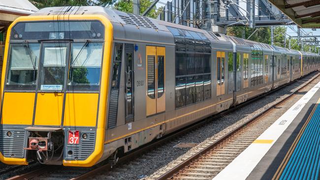 A train approaching Erskineville train station. mass cancellations and delays are expected to continue throughout the day. Picture: Thomas Lisson