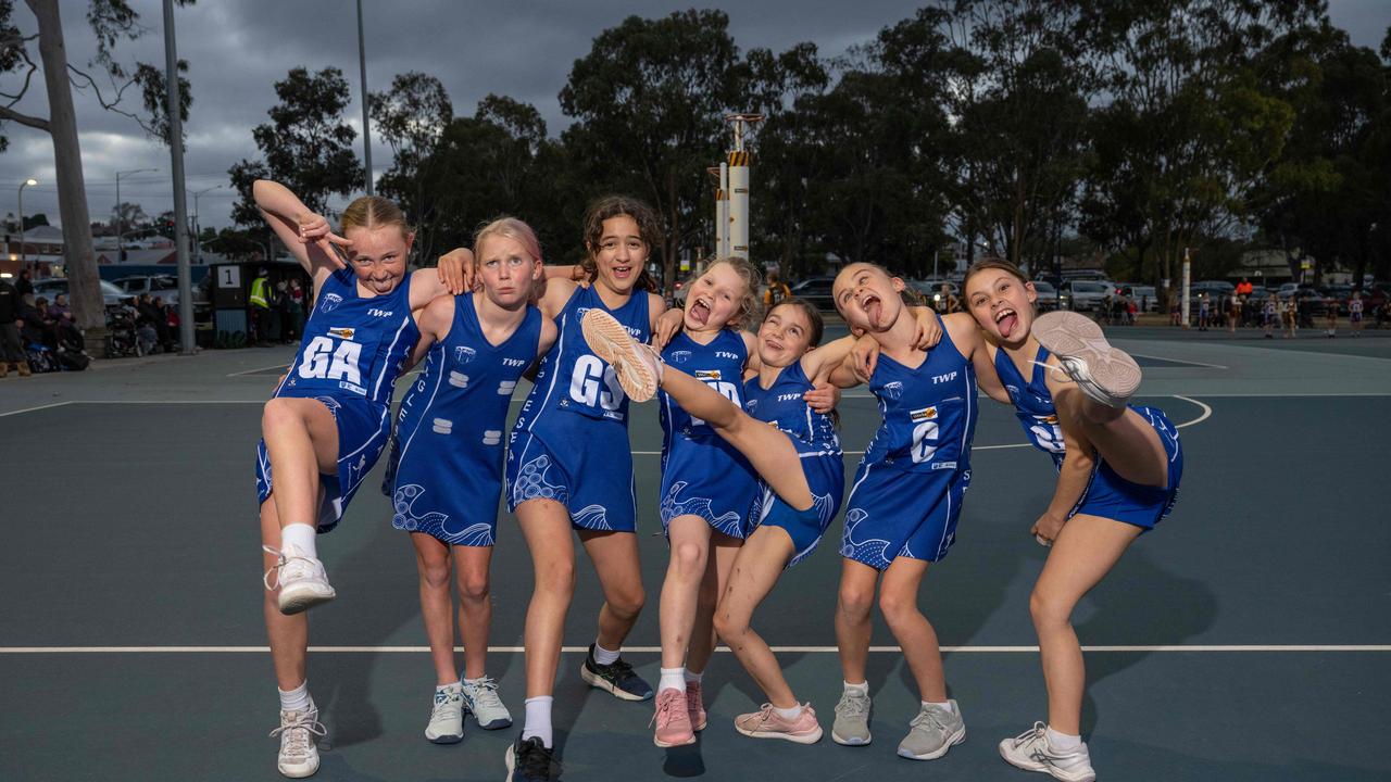 Anglesea White under-11 netball team pull their funniest faces.