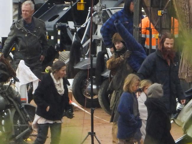 The Furiosa film set is a Hemsworth family affair with dad Craig (top left), wife Elsa Pataky (bottom left), and the kids with Chris (bottom right) seen on Saturday. Picture: Media Mode