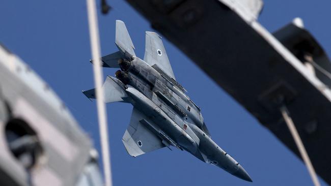 An Israeli F15 performs manuevers in a multilateral aeronautical exercise over the Mediterranean Sea. Picture: AFP