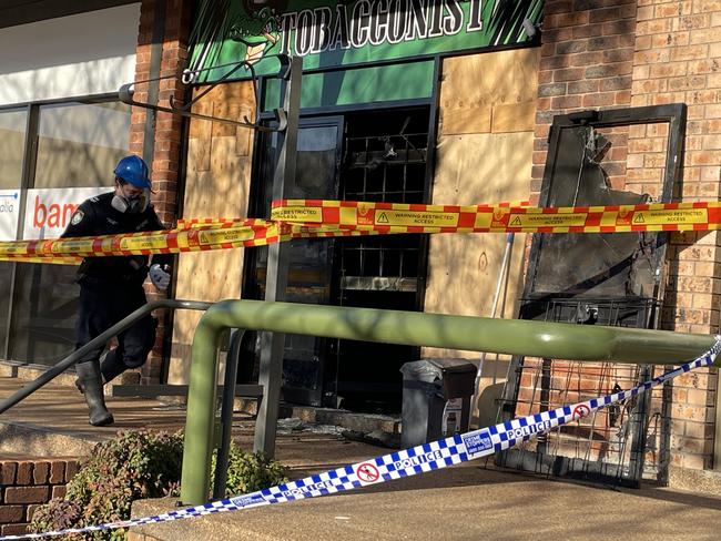 The Pulteney St tobacconist was left blackened and a door appeared to have been blown out onto the footpath on Thursday morning. Picture: Janine Watson/Mid-North Coast News