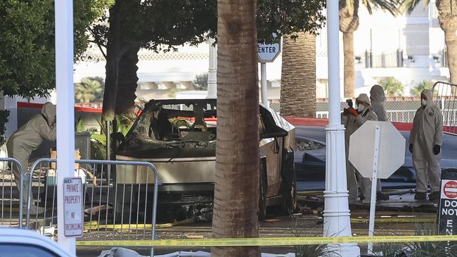 Investigators photograph a Tesla Cybertruck that exploded outside the lobby of President-elect Donald Trump's Las Vegas hotel. Picture: AFP