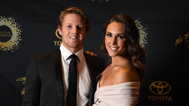 Rory Sloane with partner Belinda Riverso at the Adelaide Convention Centre red carpet ahead of the award presentation. Photo: Tom Huntley