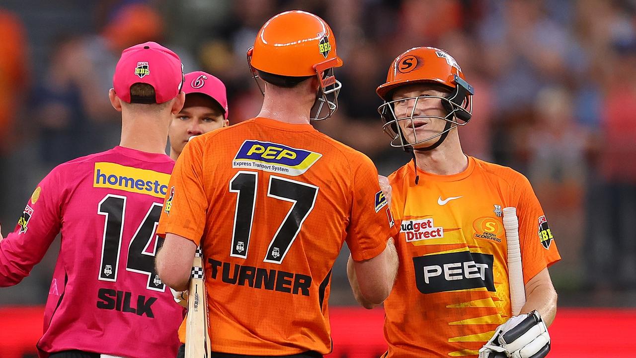 Cameron Bancroft and Ashton Turner enjoy a Scorchers win.