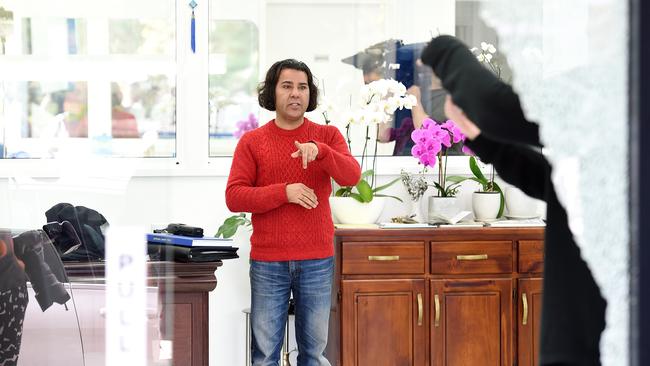 Jewellery store owner Mohammed Jafari looks on at the damage. Picture: Josie Hayden