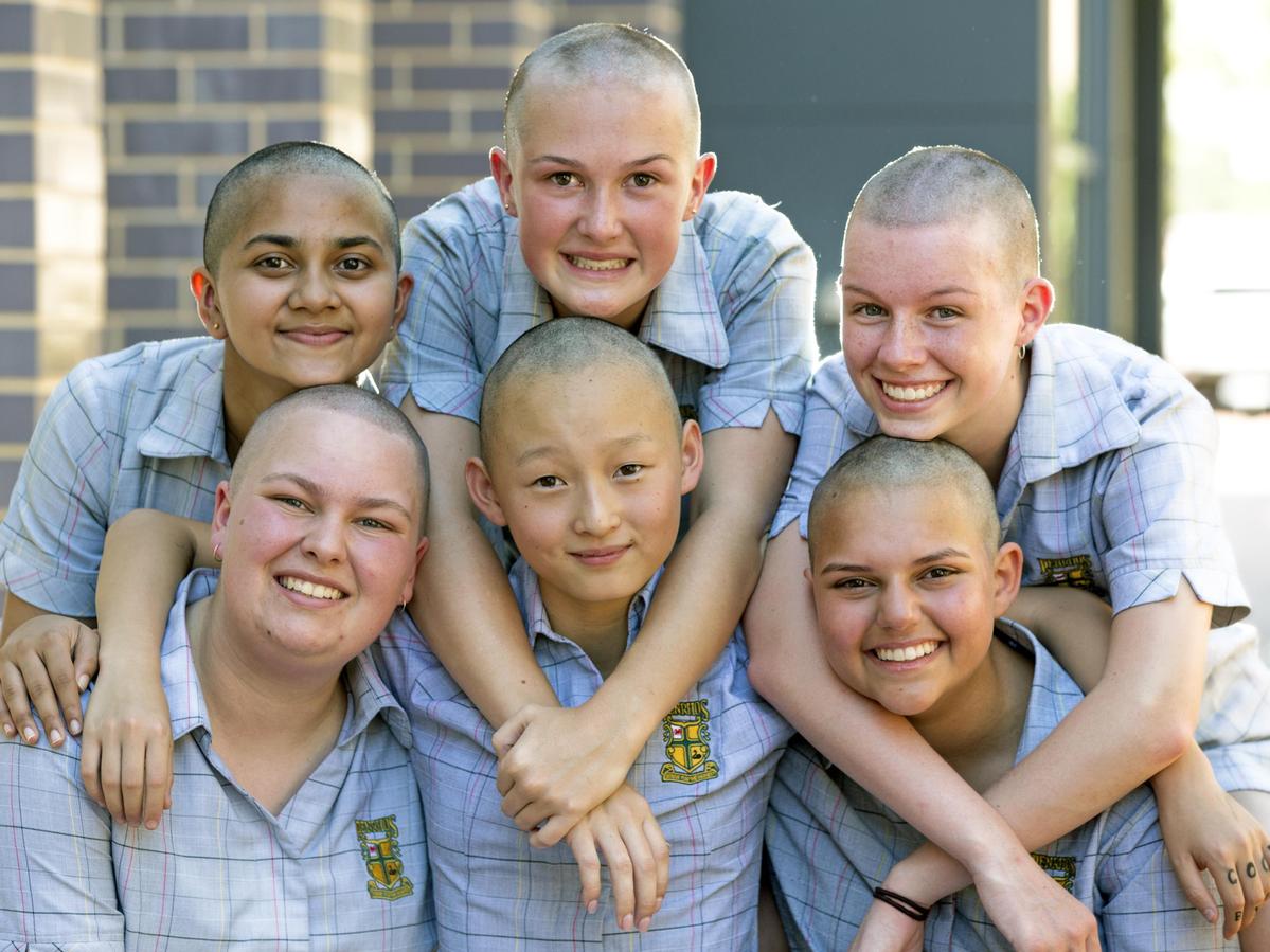 Penrhos College students Harini Weerakoon, Claire Atwood , Zoe Dick, Caitlyn Roshkov, Sophie McPhail, and Sarrah Cornall pictured after having their heads shaved for the Cancer Council.