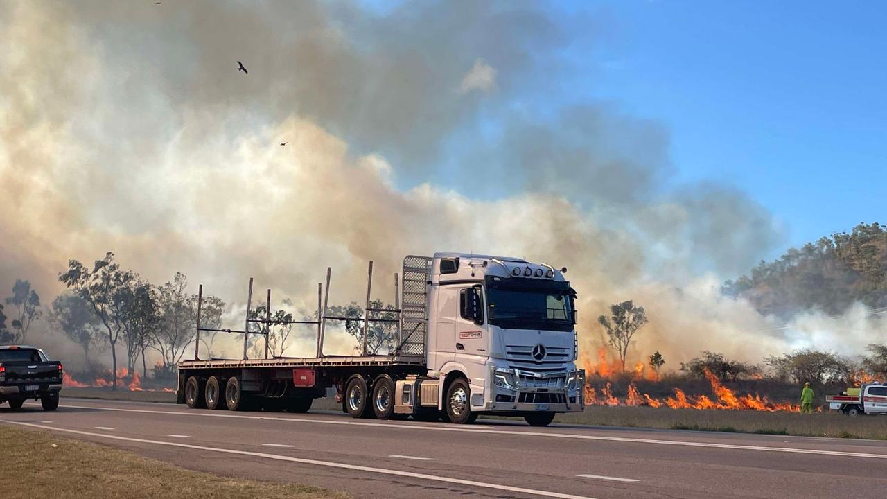 WATCH: Bruce Highway cut by blaze as fireys defend properties