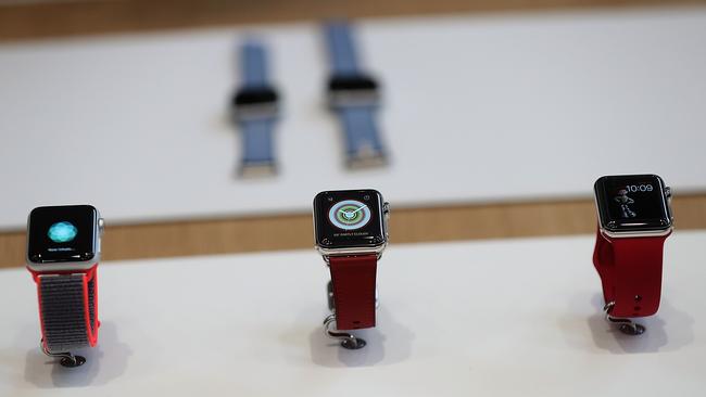 The new Apple Watch will be released at the same time as sporty new accessories, including the Sports Loop band, pictured left. Picture: Justin Sullivan/Getty Images/AFP