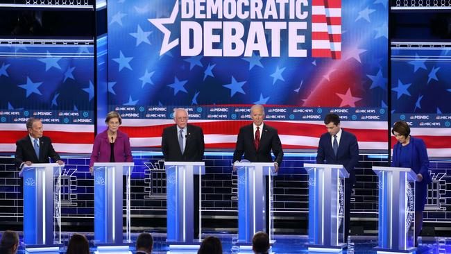 Democratic presidential candidates (L-R) Mike Bloomberg, Elizabeth Warren, Bernie Sanders, Joe Biden, Pete Buttigieg, and Amy Klobuchar at the Las Vegas debate. Picture: AFP