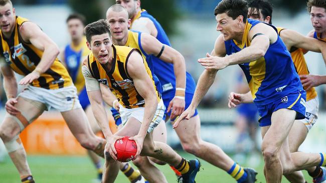 Consider Hawk James Cousins, pictured in action in the VFL last season, for your SuperCoach team.