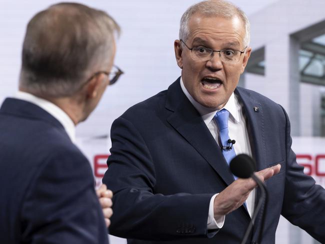 SYDNEY, AUSTRALIA - MAY 08: (L-R) Australian opposition leader Anthony Albanese and Australian Prime Minister Scott Morrison debate on live television ahead of the federal election, during the second leaders' debate of the 2022 federal election campaign at the Nine studio on May 8, 2022 in Sydney, Australia. The Australian federal election will be held on Saturday 21 May with Liberal leader Scott Morrison looking to secure a fourth term in power for the Coalition against Labor and opposition leader Anthony Albanese. (Photo by Alex Ellinghausen - Pool/Getty Images)