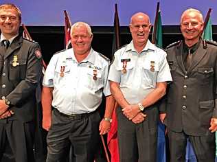 Inspector John Welke and Commander Hemmo De Vries with (middle) Roni Bau and James Massie. Picture: Contributed