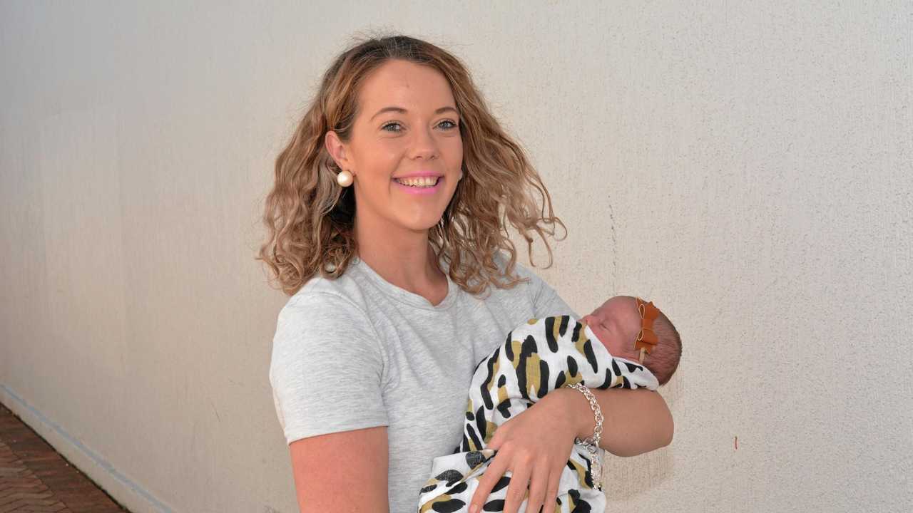 TOUCH AND GO: Lacee Buzza with daughter Zia. Picture: Meg Bolton