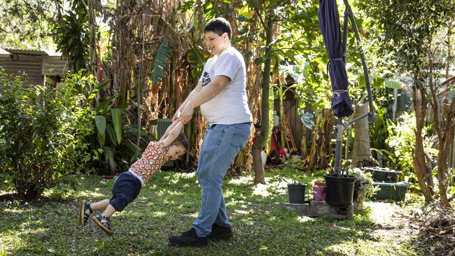 Roy playing in the backyard with Jack, 18 months. Picture: Mark Cranitch.