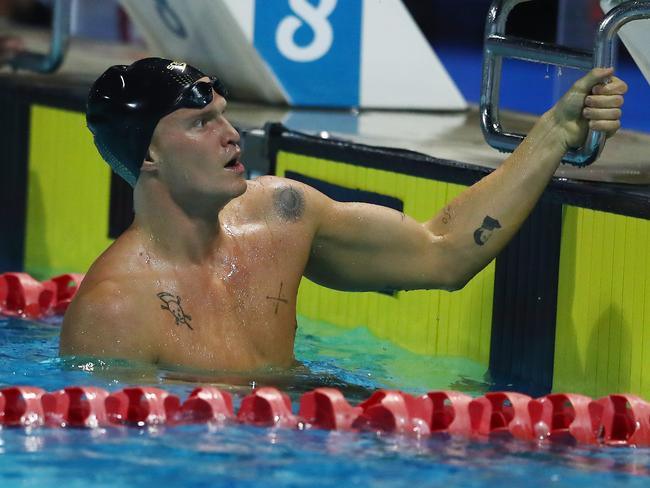 Cody Simpson checks his time after swimming the men’s 50m butterfly at the 2021 Australian Swimming Championships on Saturday. Picture: Chris Hyde/Getty Images