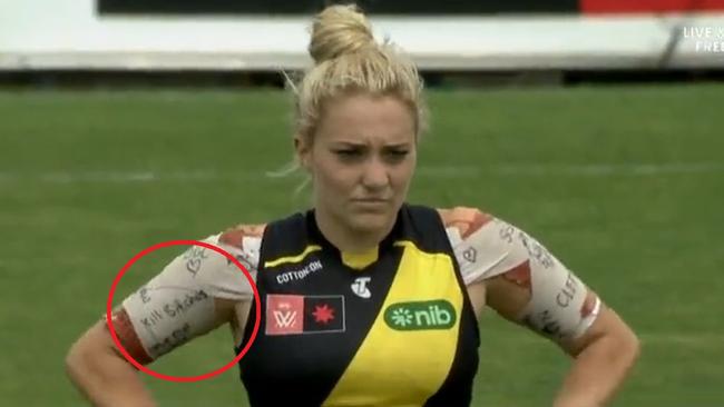 Richmond's Jess Hosking with messages written on her shoulder tape.