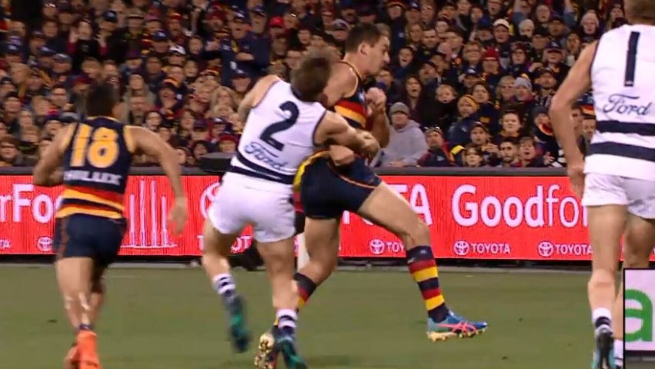 Taylor Walker cleans up Zach Tuohy.
