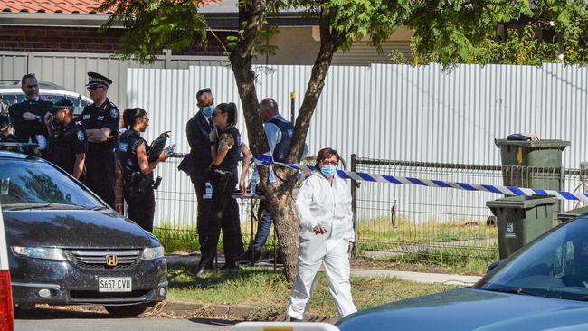 Police at the scene where a 76-year-old woman and 55-year-old man have been murdered in their home at 2 Rosetta St, Rosewater. Picture: Brenton Edwards