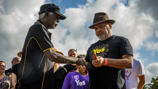 Noel Pearson receives a message stick from a Yolngu elder. Picture: Tamati Smith/Getty Images